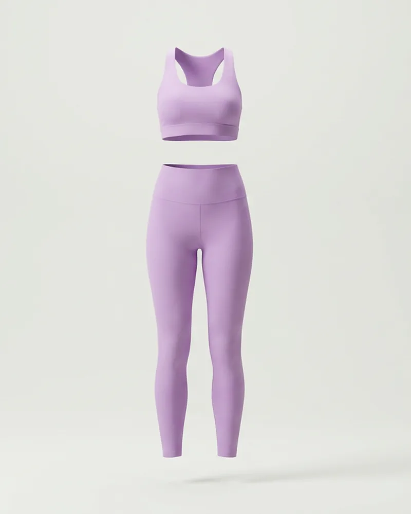 Lilac sports bra and matching high rise leggings on a pale grey background